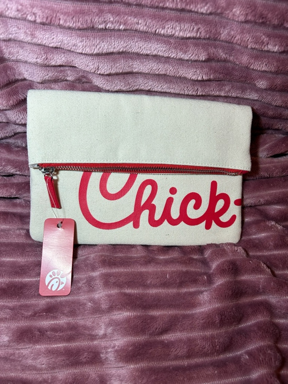 NWT Cream Fold-Over Canvas Clutch with Red Script Accent